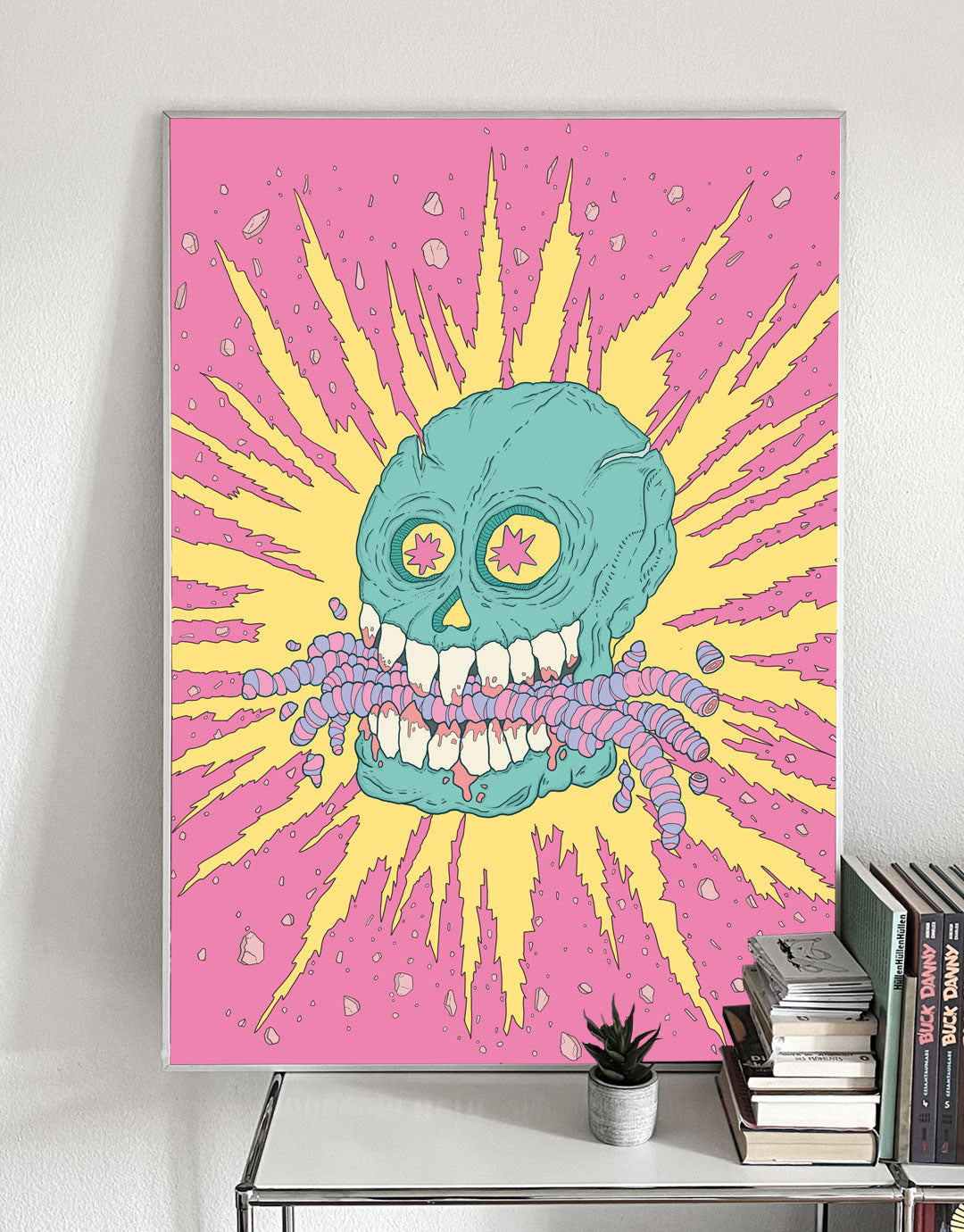 Skateboard Art Poster mit einer kreativen Illustration von Würmern, welche von einem Schädel verschlingt werden, umgeben von lebendigen Farben und dynamischen Mustern. Inspiriert von urbaner Kunst und zeitgenössischem Design, ideal für Liebhaber von ausgefallenen und verspielten Motiven.